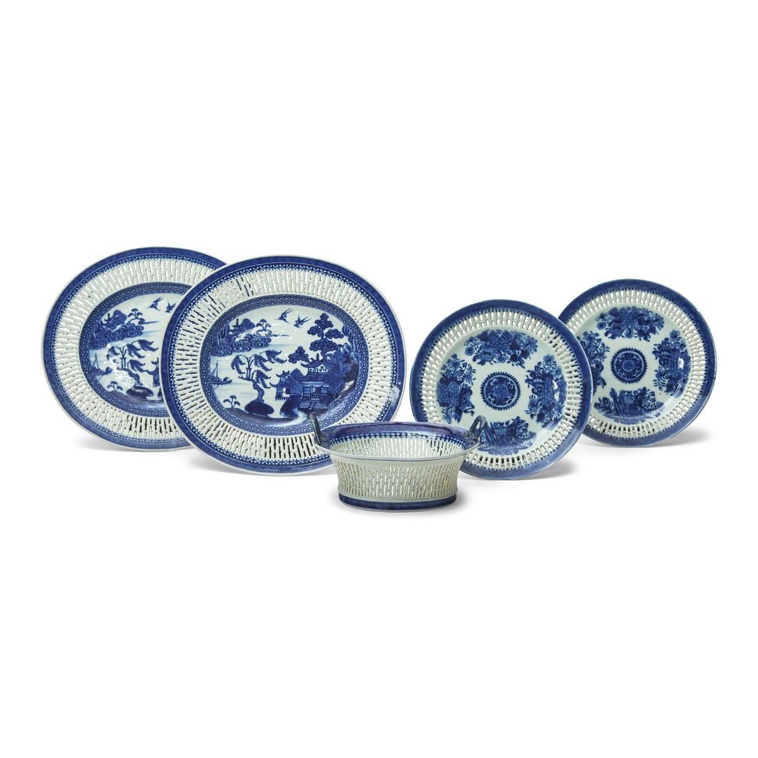 A Group of Five Chinese Export Porcelain Fitzhugh Tablewares: A Group of Five Chinese Export Porcelain Fitzhugh Tablewares Late 18th Century comprising a pair of reticulated undertrays, a pair of reticulated plates, and a reticulated chestnut basket. 9 3/4 x 11
