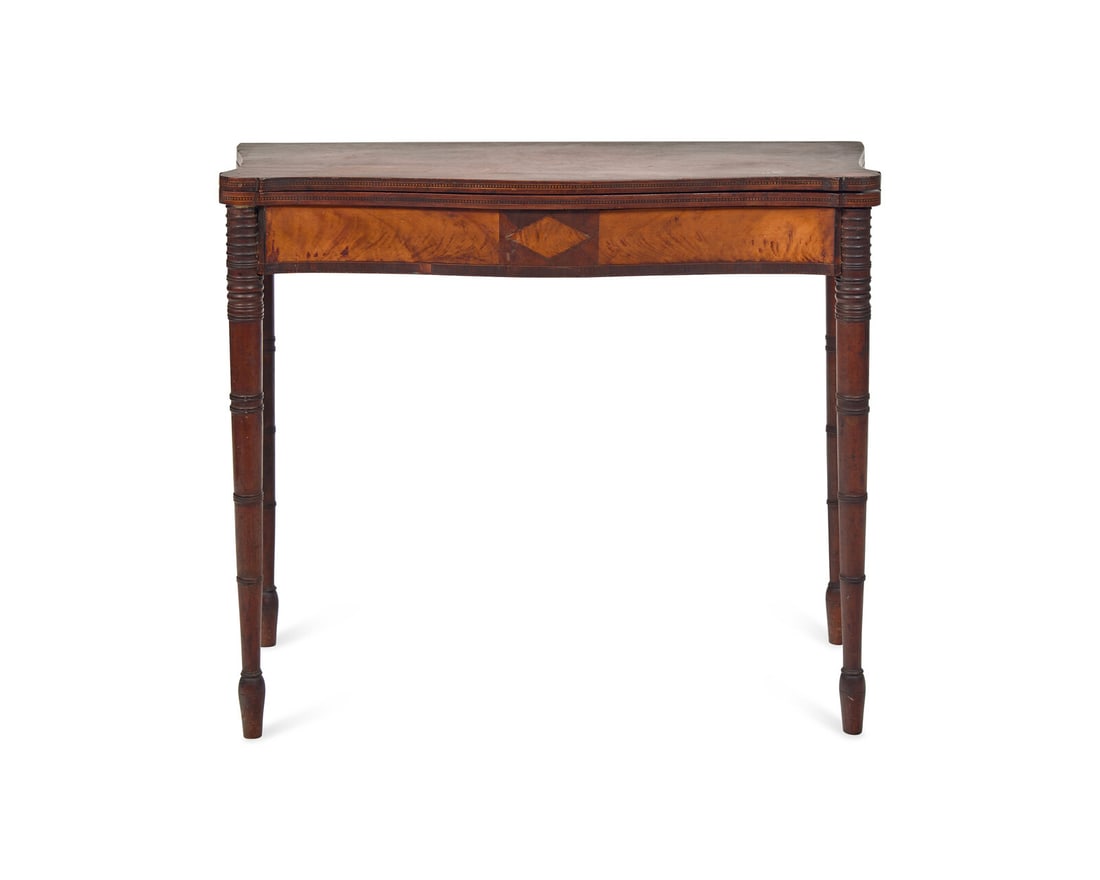 A Federal Inlaid Mahogany Card Table: A Federal Inlaid Mahogany Card Table Salem or North Shore, Massachusetts, Circa 1810 with serpentine top having outset corners, on turned legs with peg feet. Height 28 1/2 x width 36 x depth 17 inches