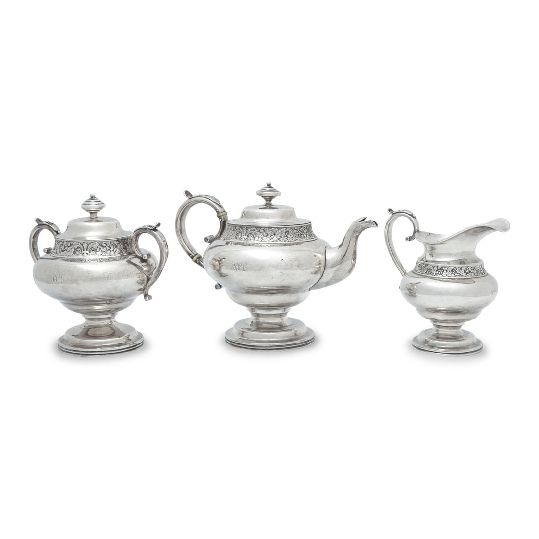 A Classical Three-Piece Coin Silver Tea Service (1 of 2)
