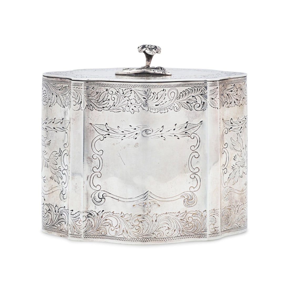 A Silver Tea Caddy: A Silver Tea Caddy H.M. Ritterband, First Half 19th Century the underside impressed, "H.M. Ritterband", and stamped with leaf and star motifs as well as pseudo English hallmarks. Height 4 3/4 x width