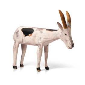 A Folk Art Carved and Painted Wood Figure of a Goat