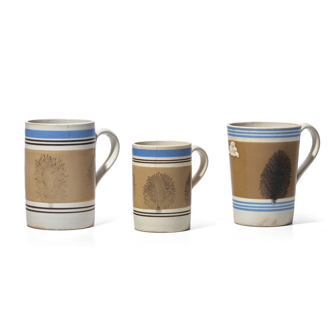 A Group of Three Large Mochaware Mugs with "Seaweed Decoration" (1 of 2)