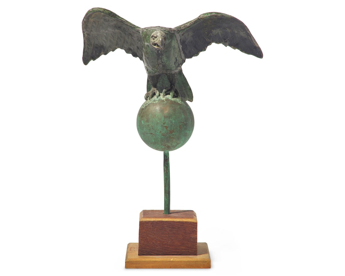 A Patinated Copper and Zinc Eagle Weathervane: A Patinated Copper and Zinc Eagle Weathervane Late 19th Century on later wood base. Height 20 1/2 x width 15 1/4 x depth 12 inches (overall, including base). This lot is located in Philadelphia.