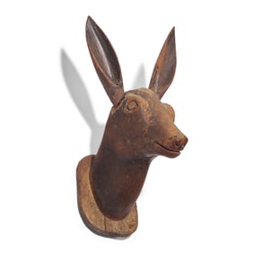 A Carved and Painted Wood Deer Head