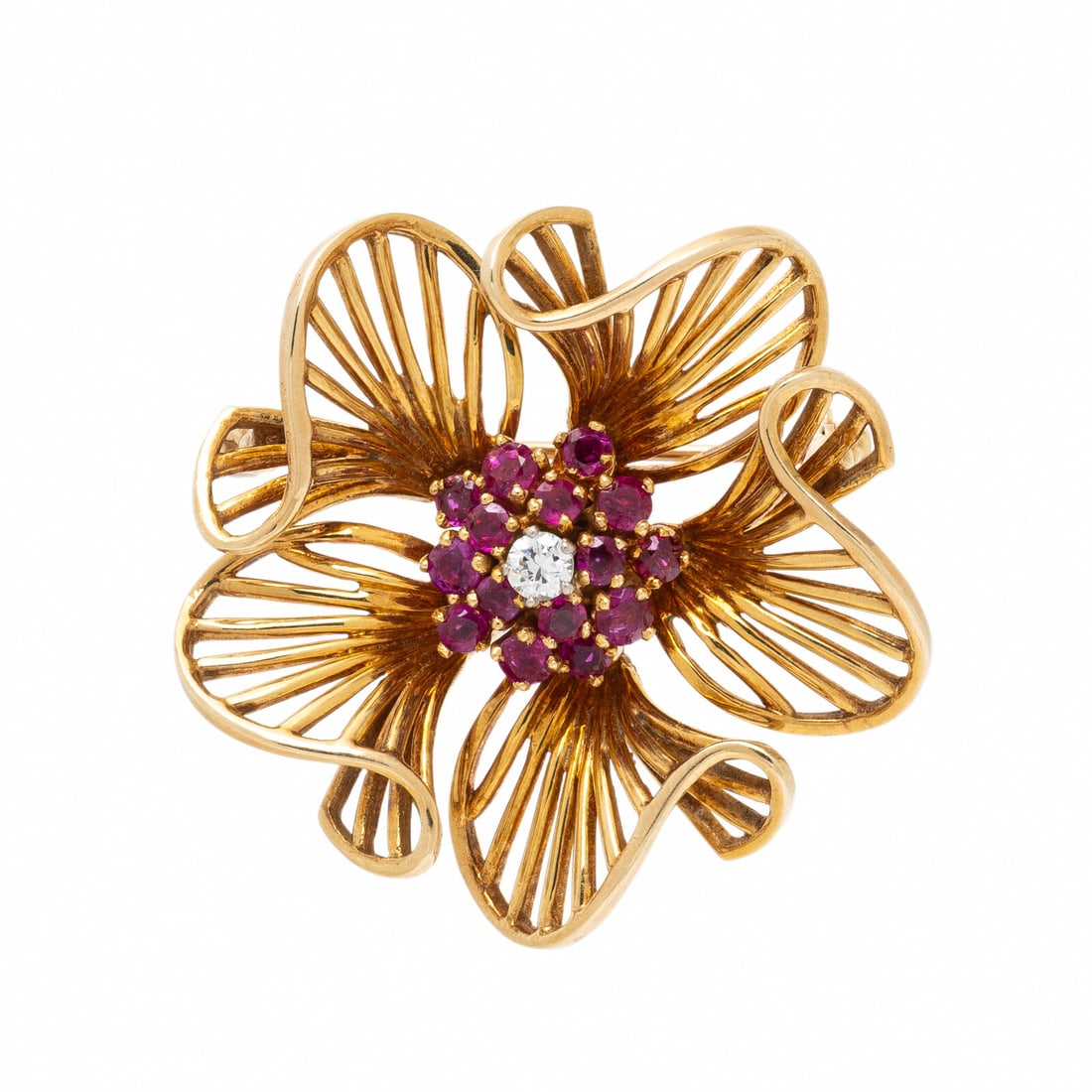 TIFFANY & CO., RUBY, DIAMOND, AND YELLOW GOLD FLOWER BROOCH: TIFFANY & CO., RUBY, DIAMOND, AND YELLOW GOLD FLOWER BROOCH Round diamond and round rubies. 14 karat yellow gold. 1 3/8 x 1 3/8 inches. Stamp: TIFFANY 14K. Gross weight: 8.70 dwt. This lot is located