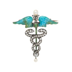 ART NOUVEAU, DIAMOND, SEED PEARL, DEMANTOID GARNET, AND ENAMEL CADUCEUS BROOCH