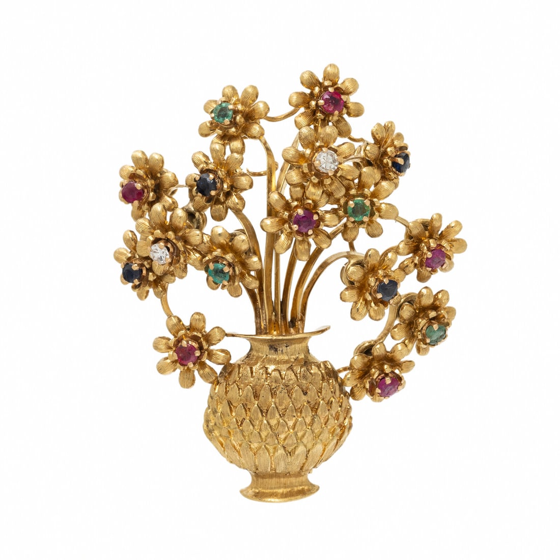 YELLOW GOLD AND MULTIGEM 'EN TREMBLANT' FLOWER BROOCH: YELLOW GOLD AND MULTIGEM 'EN TREMBLANT' FLOWER BROOCH Round diamonds, rubies, emeralds, and sapphires. 18 karat yellow gold. 1 3/4 x 1 3/8 inches. Stamp: ZOVOTA K18. Gross weight: 11.70 dwt. Property