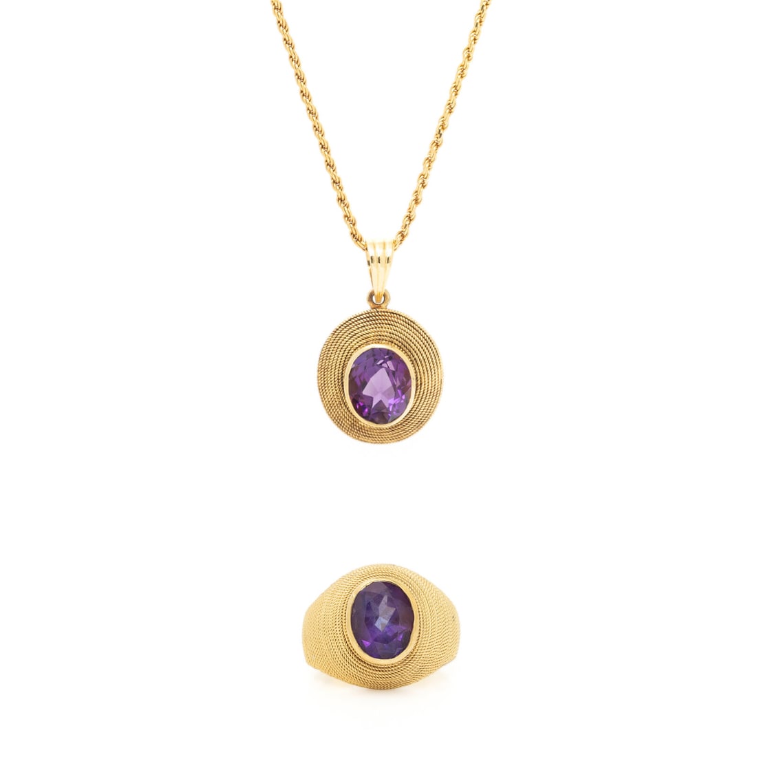 AMETHYST AND YELLOW GOLD RING AND PENDANT ON CHAIN: AMETHYST AND YELLOW GOLD RING AND PENDANT ON CHAIN Including a ring and a pendant necklace set with oval amethysts. 18 and 14 karat yellow gold. Ring size 6 1/4. Chain: 17 5/8 inches long. Pendant: 1