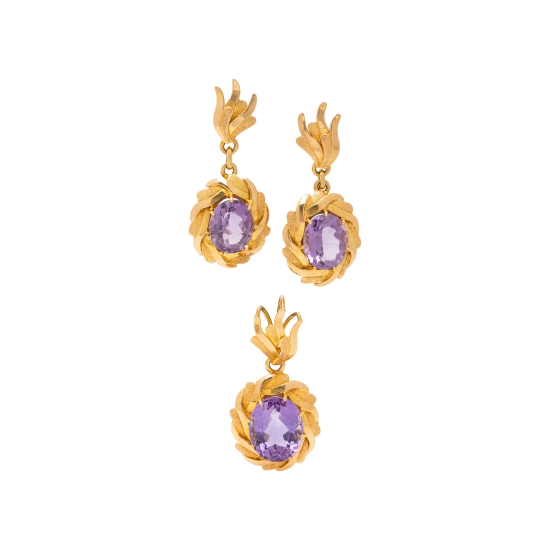 AMETHYST AND YELLOW GOLD EARRINGS AND PENDANT: AMETHYST AND YELLOW GOLD EARRINGS AND PENDANT Including a pair of earrings and a pendant set with oval cut amethysts. 18 karat yellow gold. Earrings: 1 5/8 inches long. Pendant: 1 1/2 x 3/4 inches