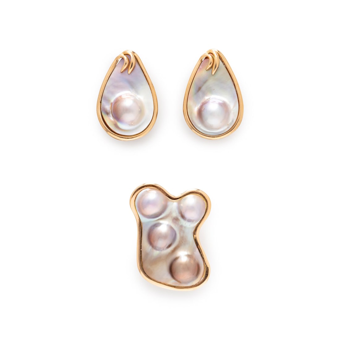 YELLOW GOLD AND CULTURED BLISTER PEARL EARRINGS AND SCARF RING: YELLOW GOLD AND CULTURED BLISTER PEARL EARRINGS AND SCARF RING Including a pair of earrings and a scarf ring set with cultured blister pearls and mother-of-pearl. 14 karat yellow gold. Earrings: 1