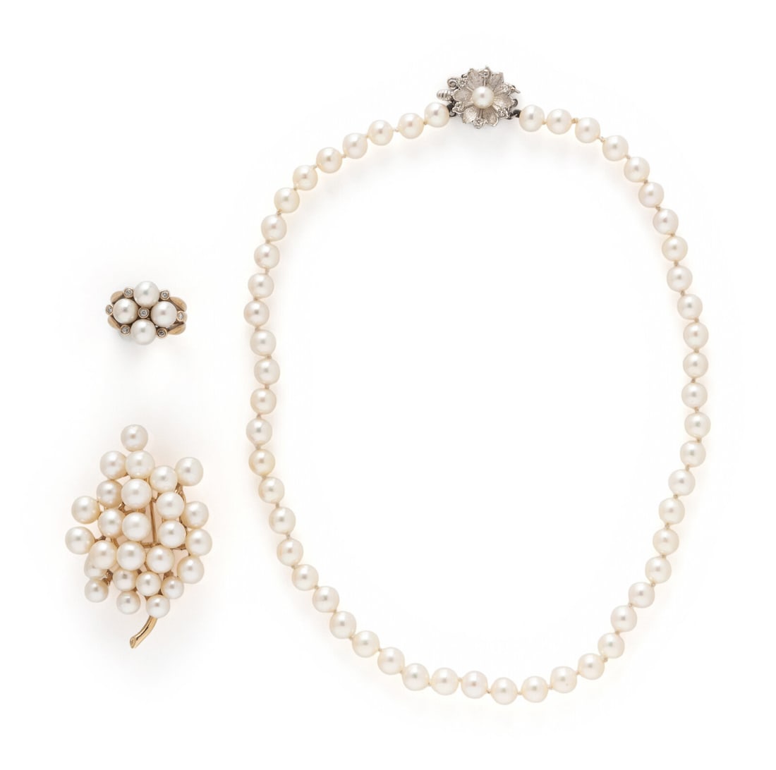 COLLECTION OF CULTURED PEARL JEWELRY: COLLECTION OF CULTURED PEARL JEWELRY Including a necklace with cultured pearls measuring approximately 6.25 - 6.60 mm with a single cut diamond-set clasp, a brooch set with cultured pearls measuring a