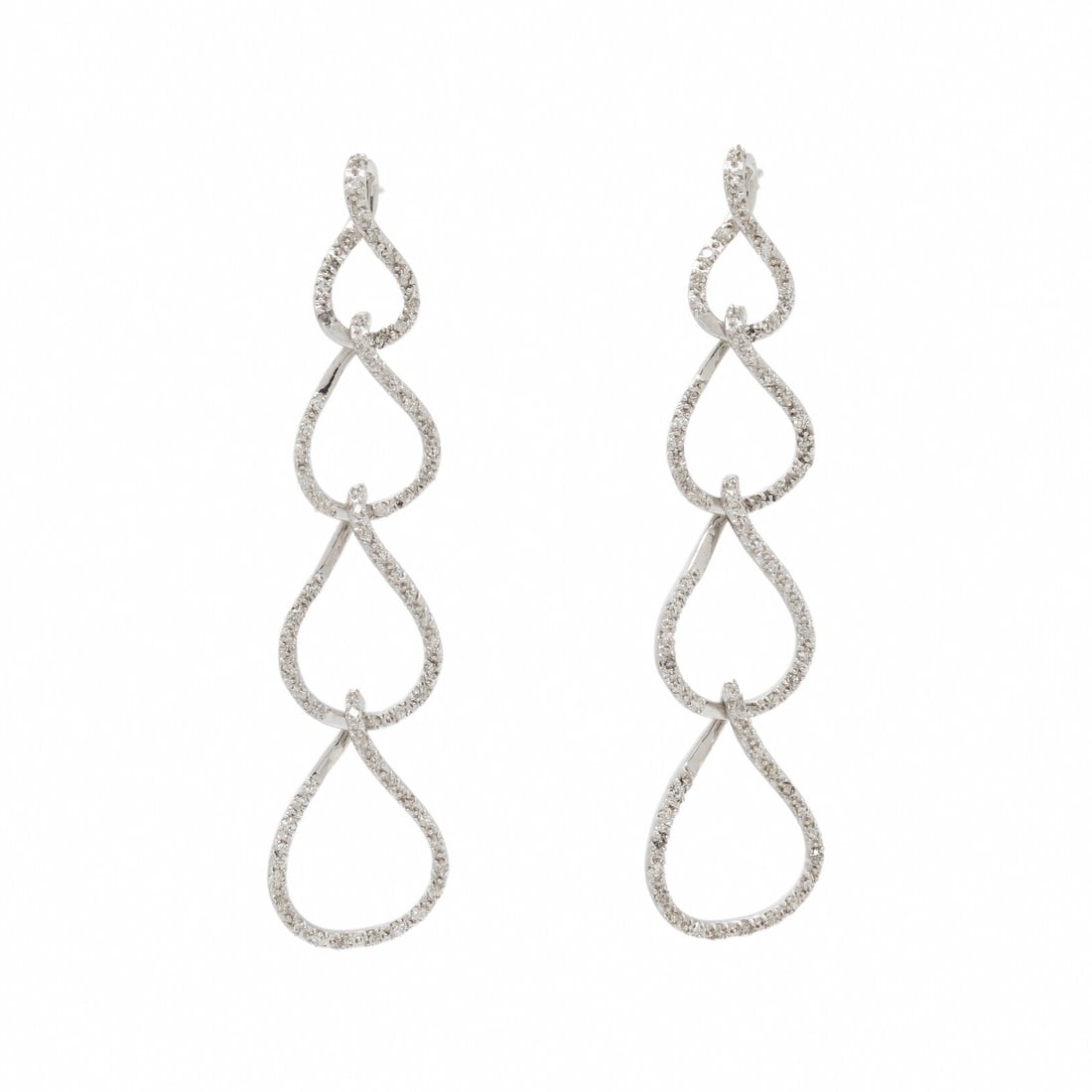 DIAMOND AND WHITE GOLD EARRINGS: DIAMOND AND WHITE GOLD EARRINGS Modified rectangular brilliant cut diamonds. White gold. 2 inches long. Gross weight: 3.45 dwt.