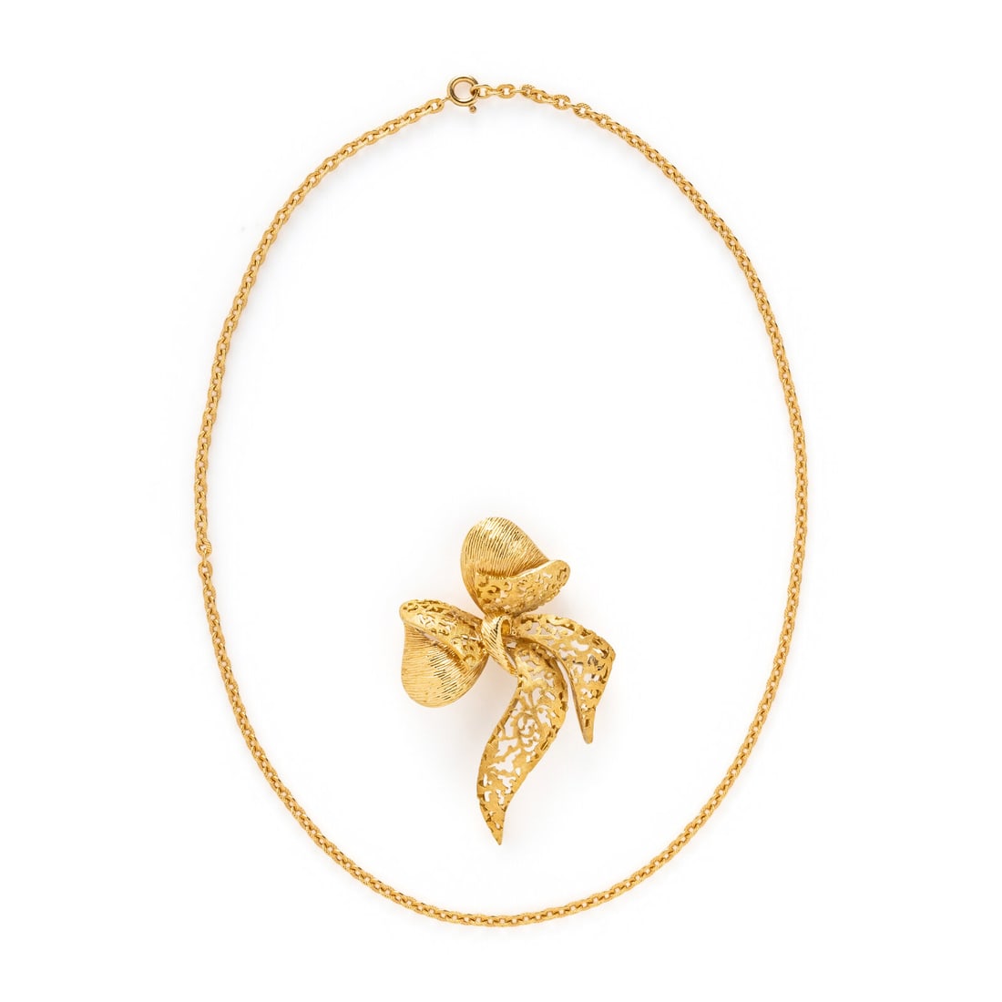 YELLOW GOLD BOW BROOCH AND CHAIN NECKLACE: YELLOW GOLD BOW BROOCH AND CHAIN NECKLACE Including a brooch and a chain necklace. 18 karat yellow gold. Brooch: 2 3/8 x 1 1/2 inches. Necklace: 16 1/2 inches. Brooch stamp: 18K. Chain stamp: 750.