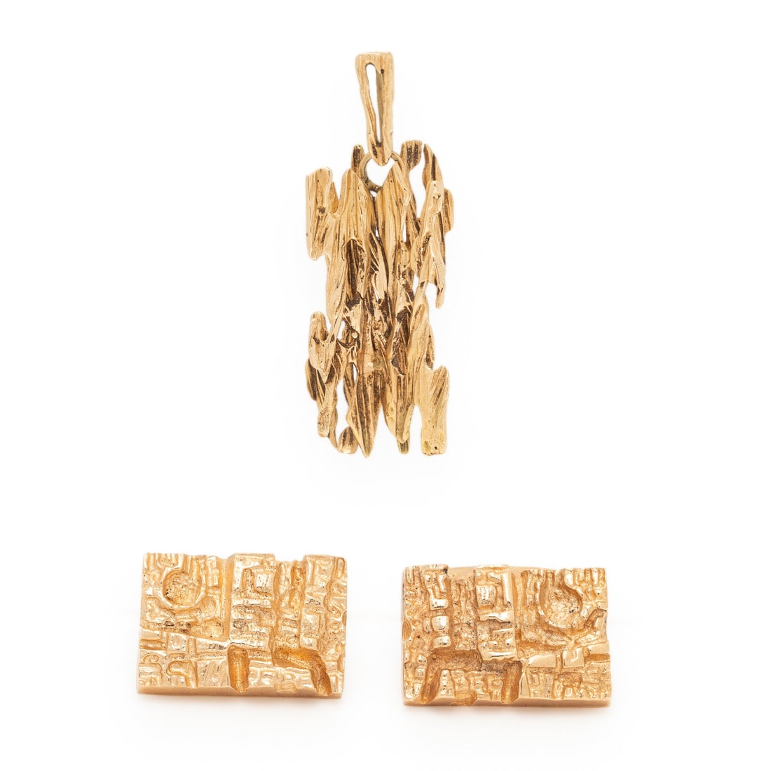 FINNISH, COLLECTION OF YELLOW GOLD NUGGET JEWELRY: FINNISH, COLLECTION OF YELLOW GOLD NUGGET JEWELRY Including a pendant and a pair of cufflinks. 14 karat yellow gold. Pendant: 1 1/2 x 1/2 inches. Cufflinks: 3/4 x 1/2 inch. Pendant stamp: (partially