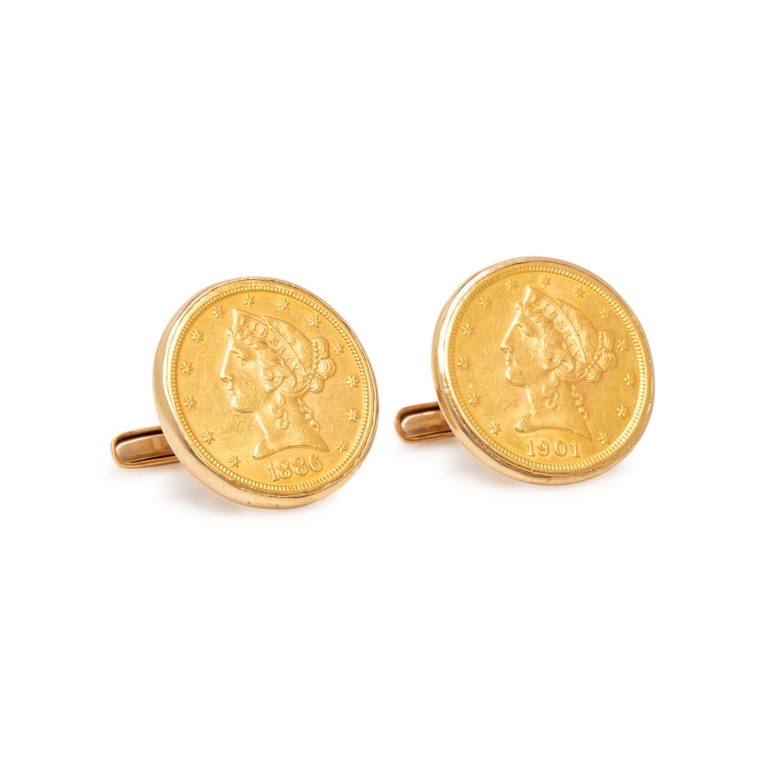 YELLOW GOLD COIN CUFFLINKS: YELLOW GOLD COIN CUFFLINKS United States Liberty Head quarters from 1886 and 1901. 14 karat and high karat yellow gold. 7/8 x 7/8 inch. Stamp: 14K (maker's mark). Gross weight: 17.35 dwt. This lot is