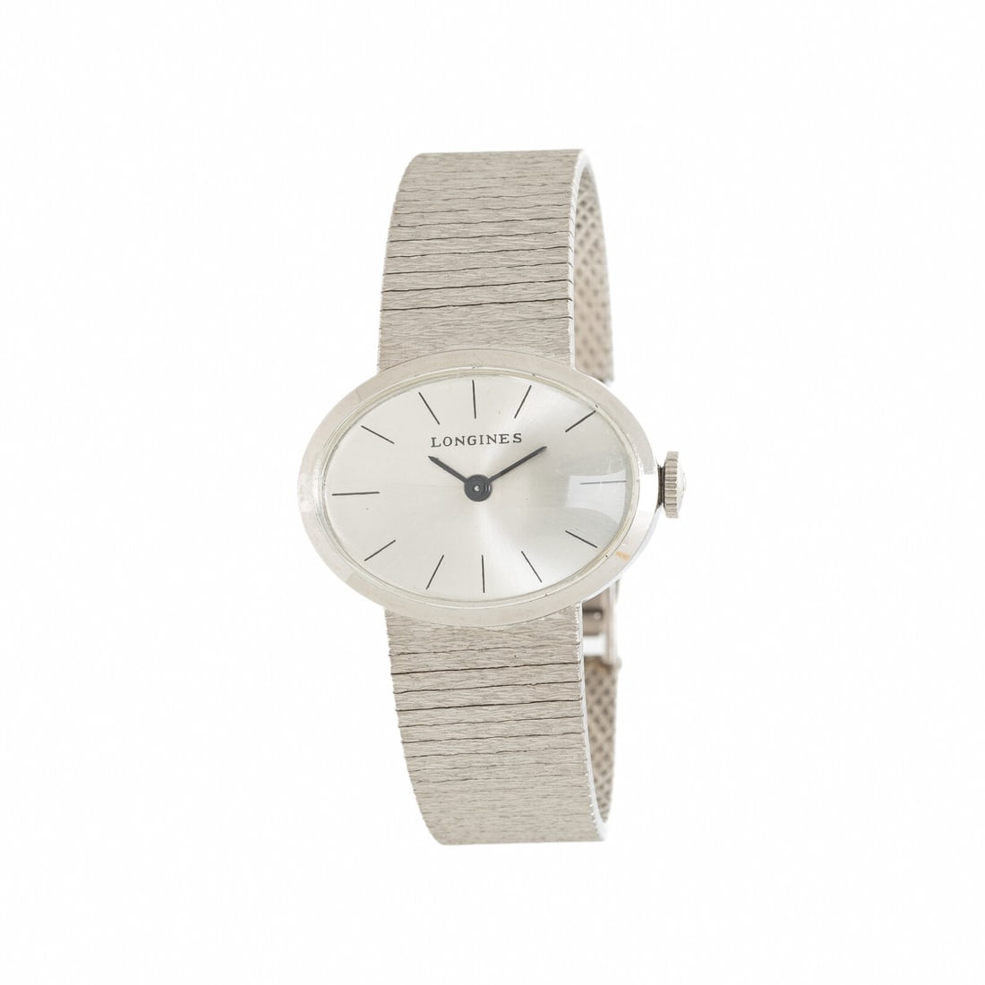 LONGINES, 14K WHITE GOLD WATCH: LONGINES, 14K WHITE GOLD WATCH Maker: Longines Case size: Approx. 23 x 17 mm Case material: 14K white gold Dial: Silvered Movement: Manual wind Bracelet/Strap: 14K white gold Stamps: Case: 14K GOLD.