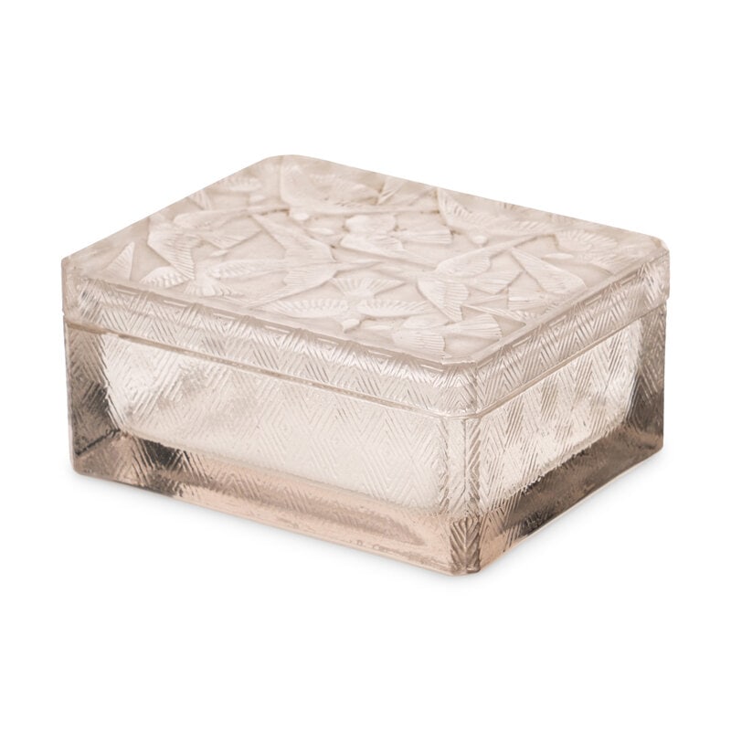 A René Lalique Glass Hirondelles Table Casket: A René Lalique Glass Hirondelles Table Casket Early 20th Century signed R. Lalique-France on underside Height 1 3/4 x width 4 x depth 3 1/8 inches. Property from the Estate of Ben Solomon,