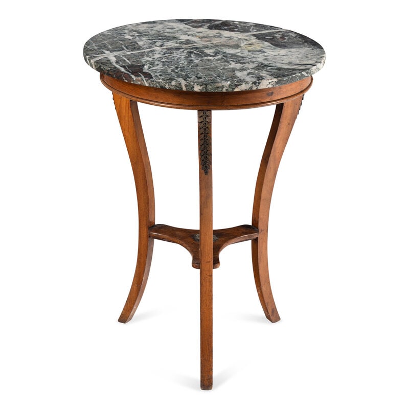 A Biedermeier Style Walnut and Marble Top End Table: A Biedermeier Style Walnut and Marble Top End Table 19th Century Height 32 x diameter 23 inches. Property from the Estate of Ben Solomon, Solomon-Paris Antiques, Indianapolis, Ind