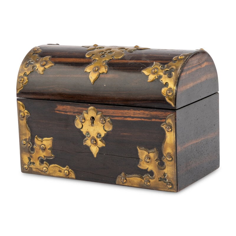 An English Brass Mounted Calamander Table Casket: An English Brass Mounted Calamander Table Casket Mid 19th Century the lid opening to a divided interior. Height 6 1/2 x width 9 x depth 5 inches. Property from the Estate of B