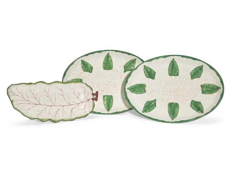 A Group of Italian Handpainted Tablewares Made for Barney's New York: A Group of Italian Handpainted Tablewares Made for Barney's New York 20th Century Comprising: A pair of oval cauliform-form serving trays A leaf-form serving dish Length of the oval serving trays 16