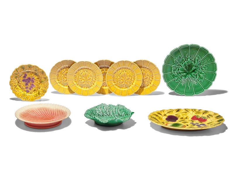A Group of Sarreguemines Majolica Tablewares: A Group of Sarreguemines Majolica Tablewares First Half 20th Century Comprising: Six mustard color grape-leaf pattern dessert plates A green grape-leaf pattern dinner plate A cabbage-lea