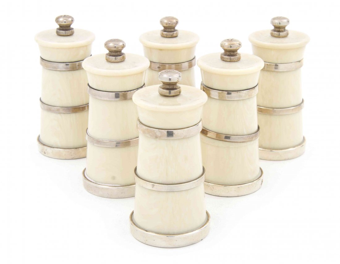 A Set of Six Elizabeth II Silver and Composite Salt and: A Set of Six Elizabeth II Silver and Composite Salt and Pepper Mills, M. C. Hersey & Son, London, 2003, of tapering cylindrical form with repeating band decoration. Height 3 3/4 inches. Property from 