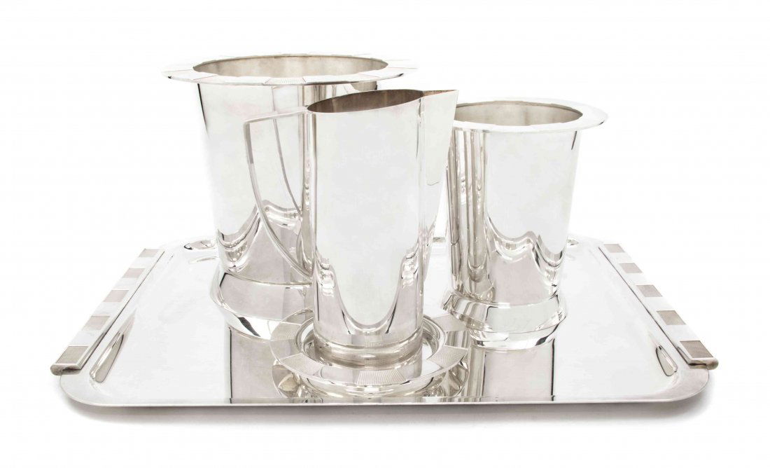 A Collection of French Silverplate Barware Articles, Ad: A Collection of French Silverplate Barware Articles, Adam D. Tihany for Christofle, designed in 2002, in the Collection 3000 pattern, comprising a wine bucket, a champagne bucket, a wine coaster, a co