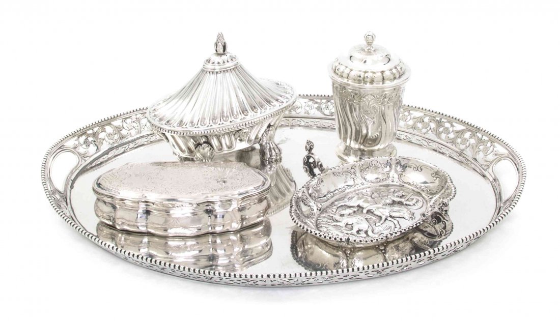 A Collection of Continental Silver Table Articles, Widt: A Collection of Continental Silver Table Articles, comprising a Dutch export tray, a German covered silver cup with the Augsburg city hallmark, an Austro-Hungarian repousse tray decorated with St. Geo
