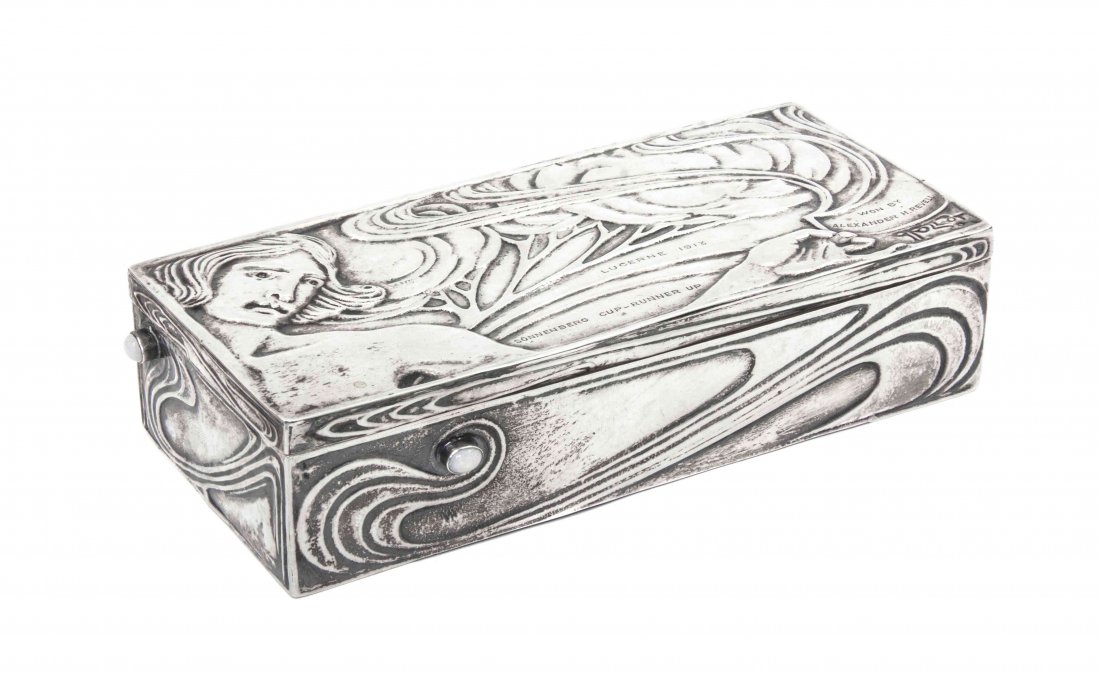 A French Arts & Crafts Opal Mounted Silver Cigarette Bo: A French Arts & Crafts Opal Mounted Silver Cigarette Box, Paul Follot, of rectangular form, the lid pressed with a stylized figure of a man and trees, inscribed Sonnenberg Cup - Runner up, Lucerne 191