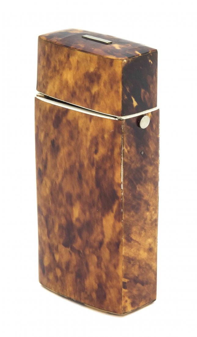 An Ivory and Tortoise Shell Veneered Necessaire Case, L: An Ivory and Tortoise Shell Veneered Necessaire Case, of rectangular form, having a push release button. Length 5 inches.