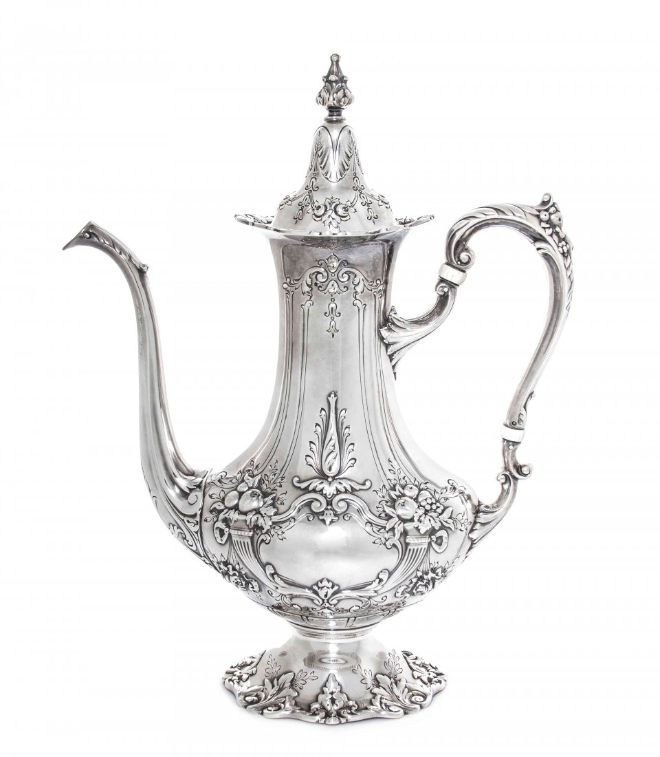 An American Sterling Silver Coffee Pot, Reed & Barton, : An American Sterling Silver Coffee Pot, Reed & Barton, in the Francis I pattern, with ivory insulators, 1 1/2 pints, bearing standard marks, numbered 570A; approximate weight overall 25.55 ozt. Height
