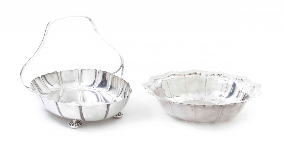 Two American Sterling Silver Table Articles, Width of w: Two American Sterling Silver Table Articles, comprising a handled basket by Watson in the Irish pattern, of shaped oval form raised on bun feet, bearing standard marks, numbered A208, and a center bow