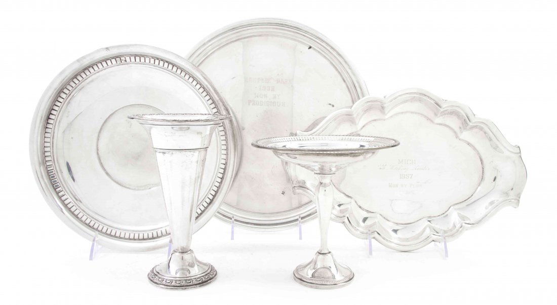 A Collection of American Sterling Silver Articles, Widt: A Collection of American Sterling Silver Articles, comprising a tray by Wallace in the Modernique pattern, a trophy by Reed & Barton in the Normandy pattern, a trophy by Randahl and a weighted compote