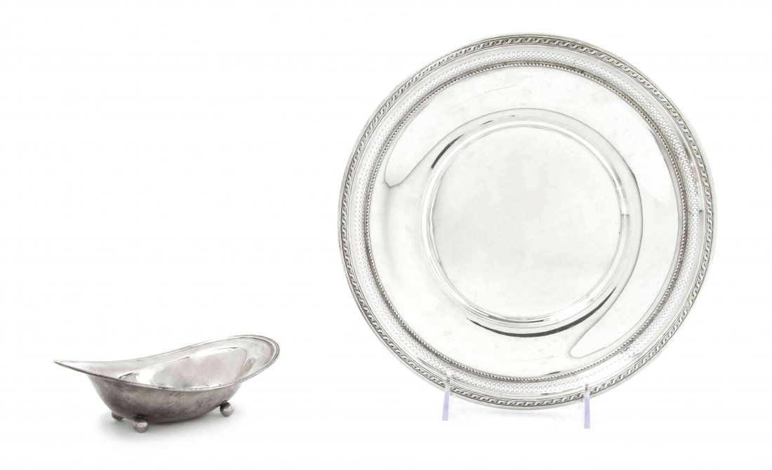 Two American Sterling Silver Table Articles, Diameter o: Two American Sterling Silver Table Articles, comprising a 1927 Gorham tray with a reticulated edge, numbered A1261, and a Dominick & Haff oval bowl raised on spherical feet, numbered 3475; approximate