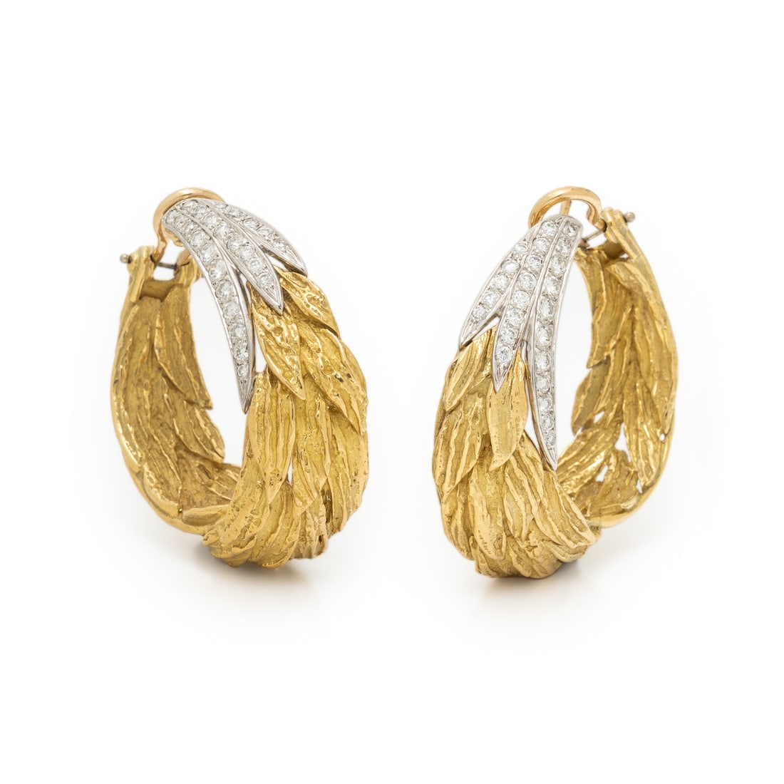 YELLOW GOLD AND DIAMOND HOOP EARRINGS: YELLOW GOLD AND DIAMOND HOOP EARRINGS Round diamonds weighing approximately 0.95 carat total. Yellow and white gold. 1 1/4 inches long. Gross weight: 20.55 dwt. Property of a Private Collector