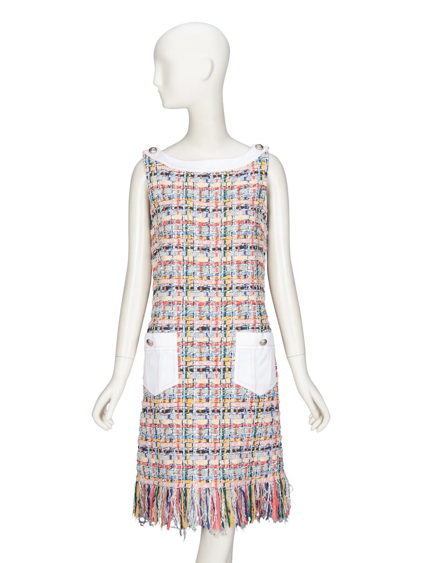 CHANEL, SLEEVELESS TWEED DRESS: CHANEL, SLEEVELESS TWEED DRESS Sleeveless summer dress in multicolor fantasy tweed with white cotton denim trim throughout. Wide bateau neckline with button and snap closures at shoulders. Two patch p
