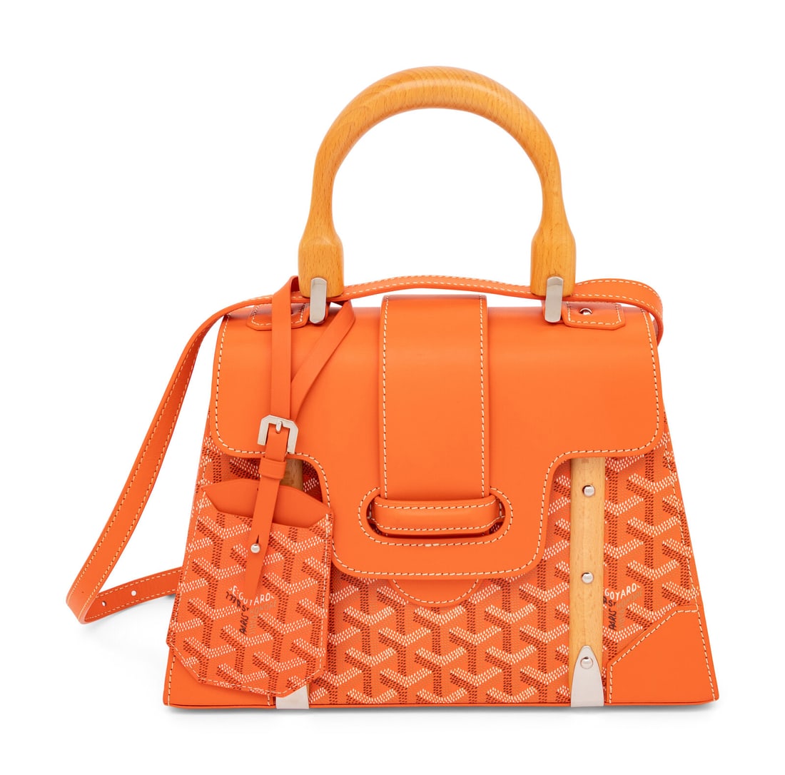 GOYARD, GOYARDINE SAIGON PM BAG: GOYARD, GOYARDINE SAIGON PM BAG Saigon PM bag in orange leather and Goyardine painted coated canvas with polished wooden details. Threaded flap closure, wooden handle, and removable flat leather strap