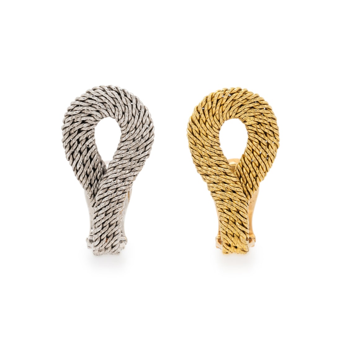 BULGARI, BICOLOR GOLD EARRINGS: BULGARI, BICOLOR GOLD EARRINGS 18 karat yellow and white gold. 1 5/16 inches long. Stamp: BVLGARI (maker's mark) 18K. Gross weight: 14.60 dwt.