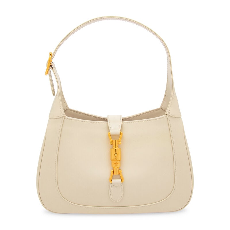 GUCCI, ALABASTER JACKIE 1961 BAG: GUCCI, ALABASTER JACKIE 1961 BAG Small Jackie 1961 bag in alabaster leather with gold-tone hardware. Push-lock 'piston' closure and adjustable flat leather strap. Label: Gucci Style/Serial No.: 636709