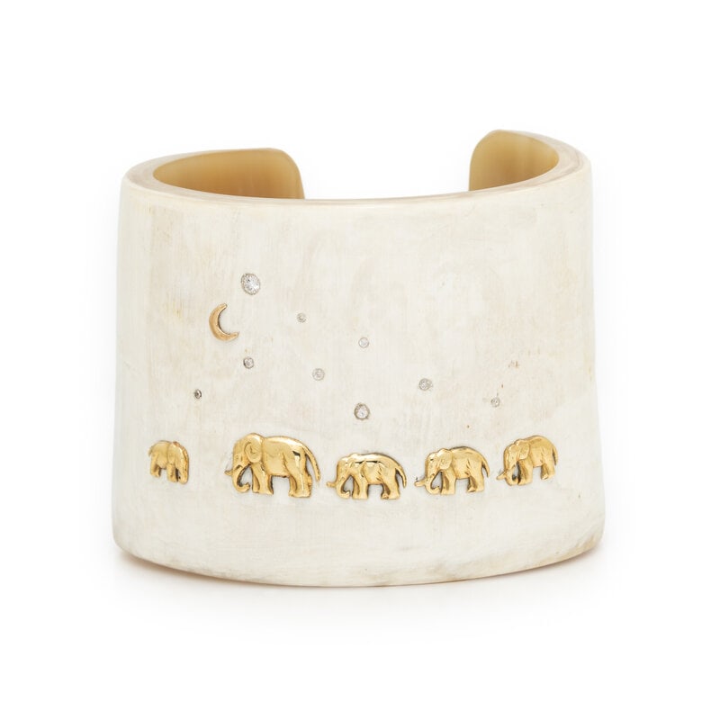 SHOMPOLE COLLECTION, RESIN, DIAMOND, AND YELLOW GOLD ELEPHANT CUFF BRACELET: SHOMPOLE COLLECTION, RESIN, DIAMOND, AND YELLOW GOLD ELEPHANT CUFF BRACELET Round diamonds and resin. Yellow gold. 5 7/8 inches inner circumference. Gross weight: 31.85 dwt.