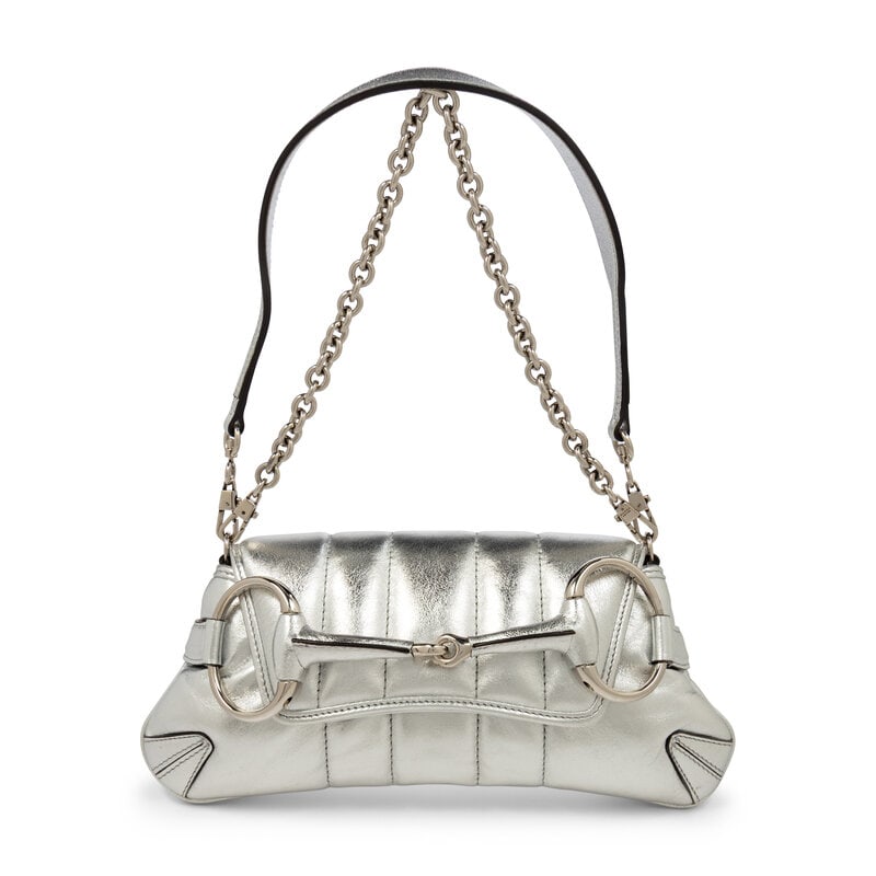 GUCCI, SILVER LEATHER HORSEBIT BAG: GUCCI, SILVER LEATHER HORSEBIT BAG Horsebit bag in metallic silver quilted leather with an oversize metal horsebit detail. Magnetic snap closure, removable metal chain strap, and removable flat