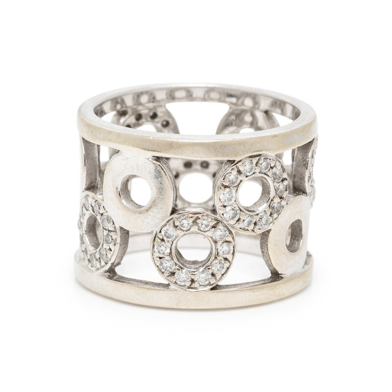 WHITE GOLD AND DIAMOND RING: WHITE GOLD AND DIAMOND RING Round diamonds. 18 karat white gold. Ring size 5 3/4. Stamp: 18K. Gross weight: 7.30 dwt. ConditionOverall Condition: A few diamonds are chipped. Light scratching to gold