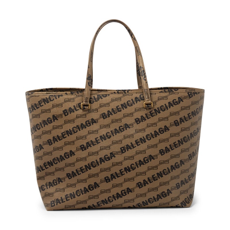 BALENCIAGA, XL LOGO TOTE: BALENCIAGA, XL LOGO TOTE XL Logo Shopping Tote bag in brown & black logo coated canvas. Latch closure at interior and flat straps. Label: Balenciaga Style/Serial No.: 702703-2762-Q Date: