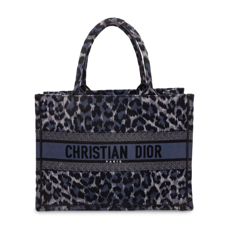 CHRISTIAN DIOR, NAVY LEOPARD MEDIUM BOOK TOTE: CHRISTIAN DIOR, NAVY LEOPARD MEDIUM BOOK TOTE Medium Book Tote bag in navy & black leopard-print jacquard. Open top and rolled handles. Label: Christian Dior Style/Serial No.: 50-MA-0232 Date: 20