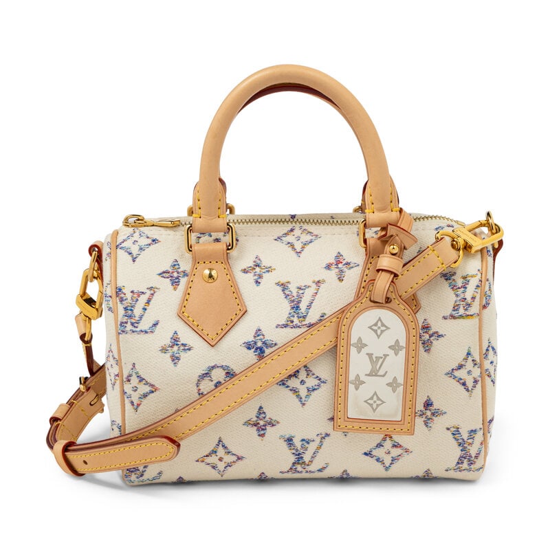 LOUIS VUITTON, SPEEDY 20 BANDOULIÈRE IN MONOGRAM JACQUARD: LOUIS VUITTON, SPEEDY 20 BANDOULIÈRE IN MONOGRAM JACQUARD Speedy 20 Bandoulière bag in white and multicolor monogram jacquard with leather trim. Zipper closure, rolled leather handles,