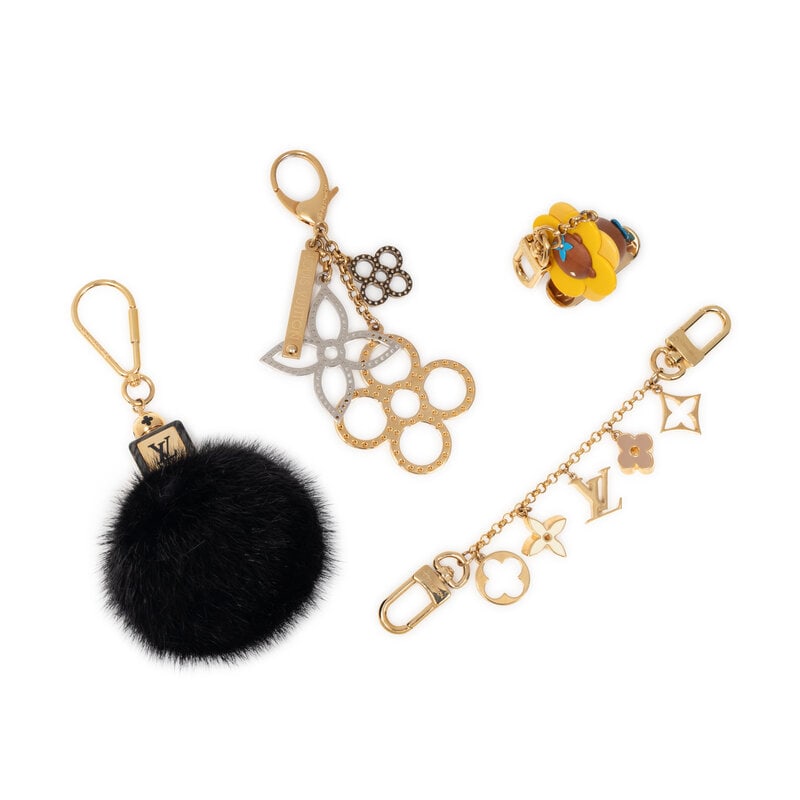 LOUIS VUITTON, GROUP OF FOUR BAG CHARMS - 2