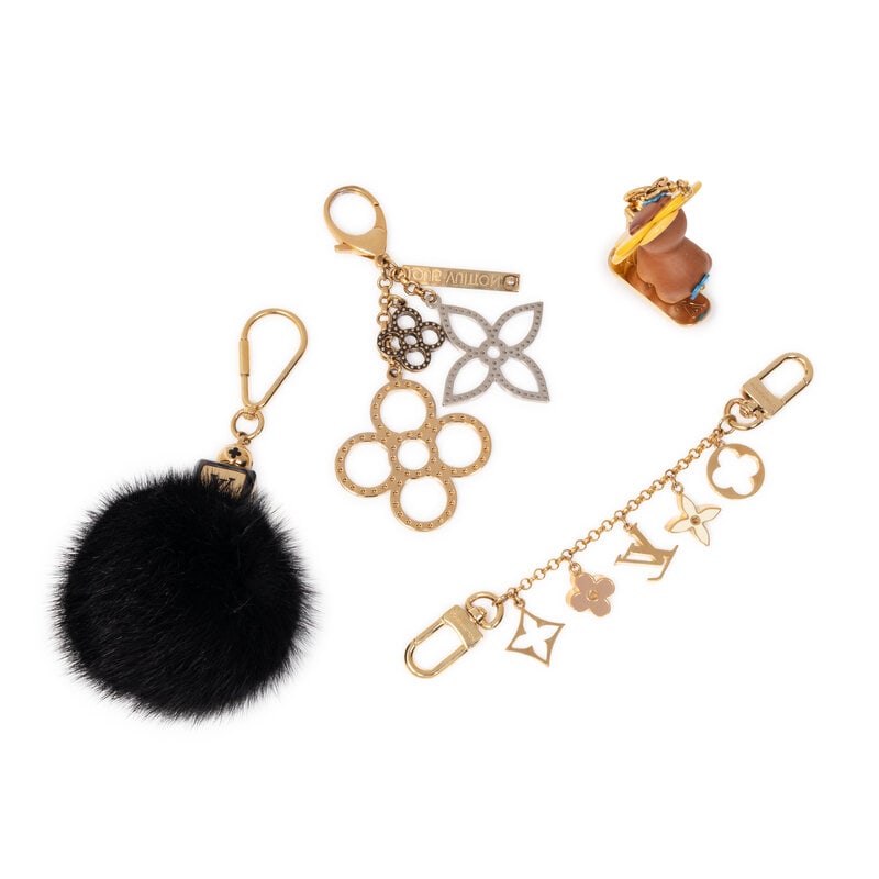 LOUIS VUITTON, GROUP OF FOUR BAG CHARMS - 3