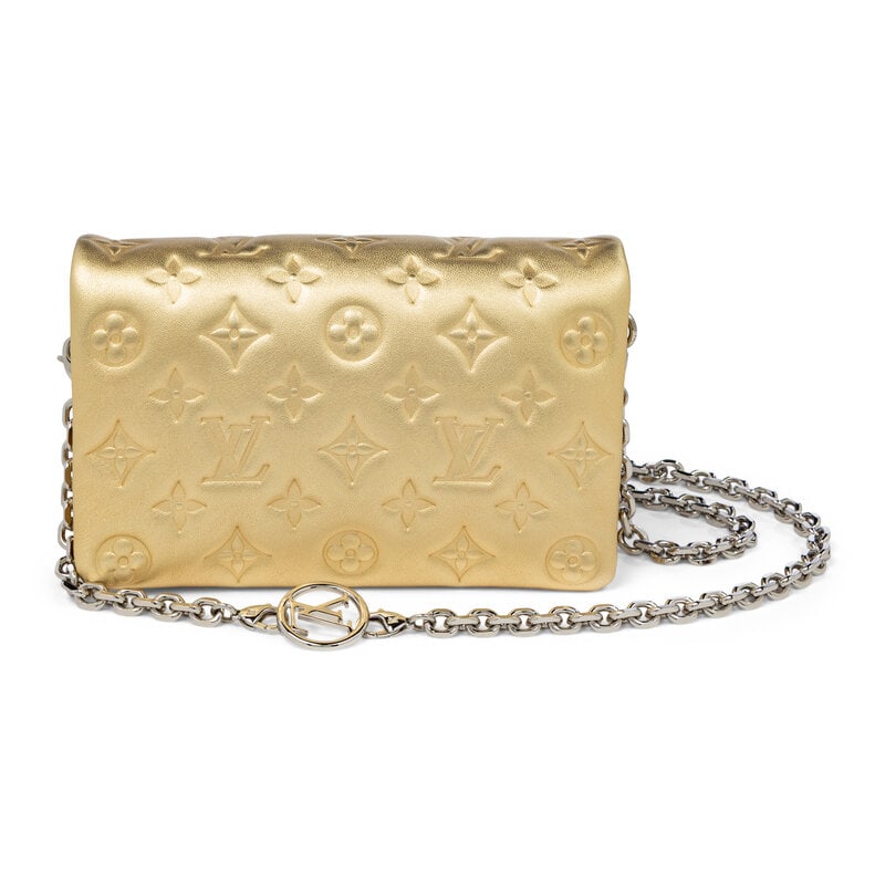 LOUIS VUITTON, COUSSIN BAG IN GOLD EMPREINTE LEATHER: LOUIS VUITTON, COUSSIN BAG IN GOLD EMPREINTE LEATHER Coussin shoulder bag in padded metallic gold Empreinte monogram leather. Magnetic snap closure and removable metal chain strap. Label: Louis