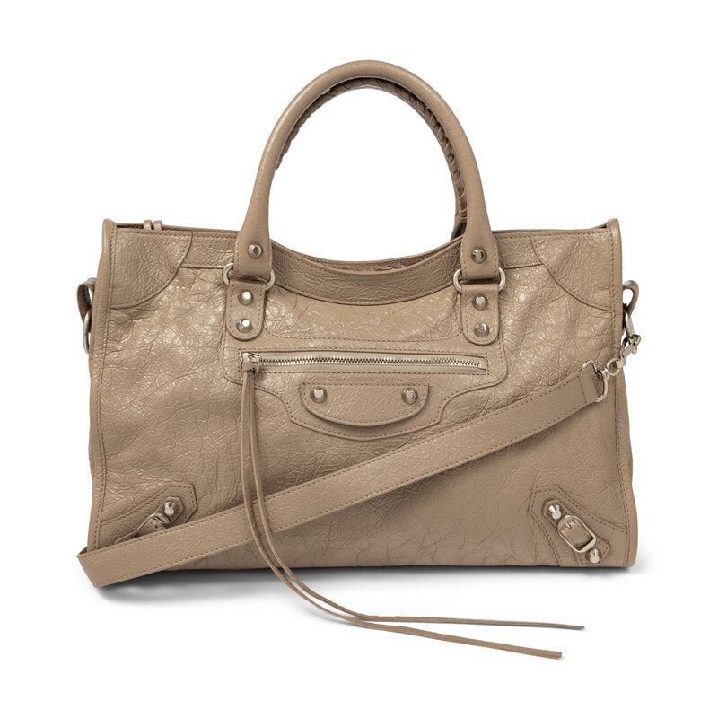 BALENCIAGA, TAUPE MEDIUM CITY BAG: BALENCIAGA, TAUPE MEDIUM CITY BAG Medium City bag int taupe glossy aged lambskin leather. Zipper closure, rolled handles with leather whipstitching, and removable flat leather shoulder strap. 