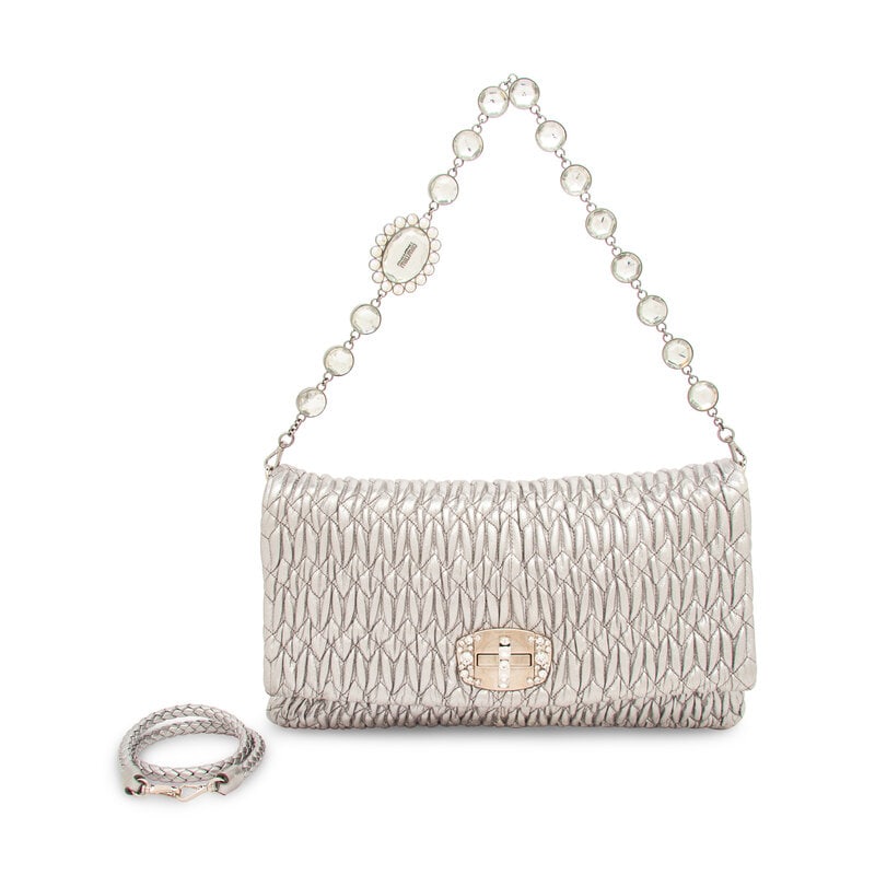 MIU MIU, QUILTED SILVER LEATHER FLAP BAG: MIU MIU, QUILTED SILVER LEATHER FLAP BAG Flap bag in quilted metallic silver leather with rhinestone embellishments throughout. Turn-lock closure and braided leather and rhinestoned chain strap. 